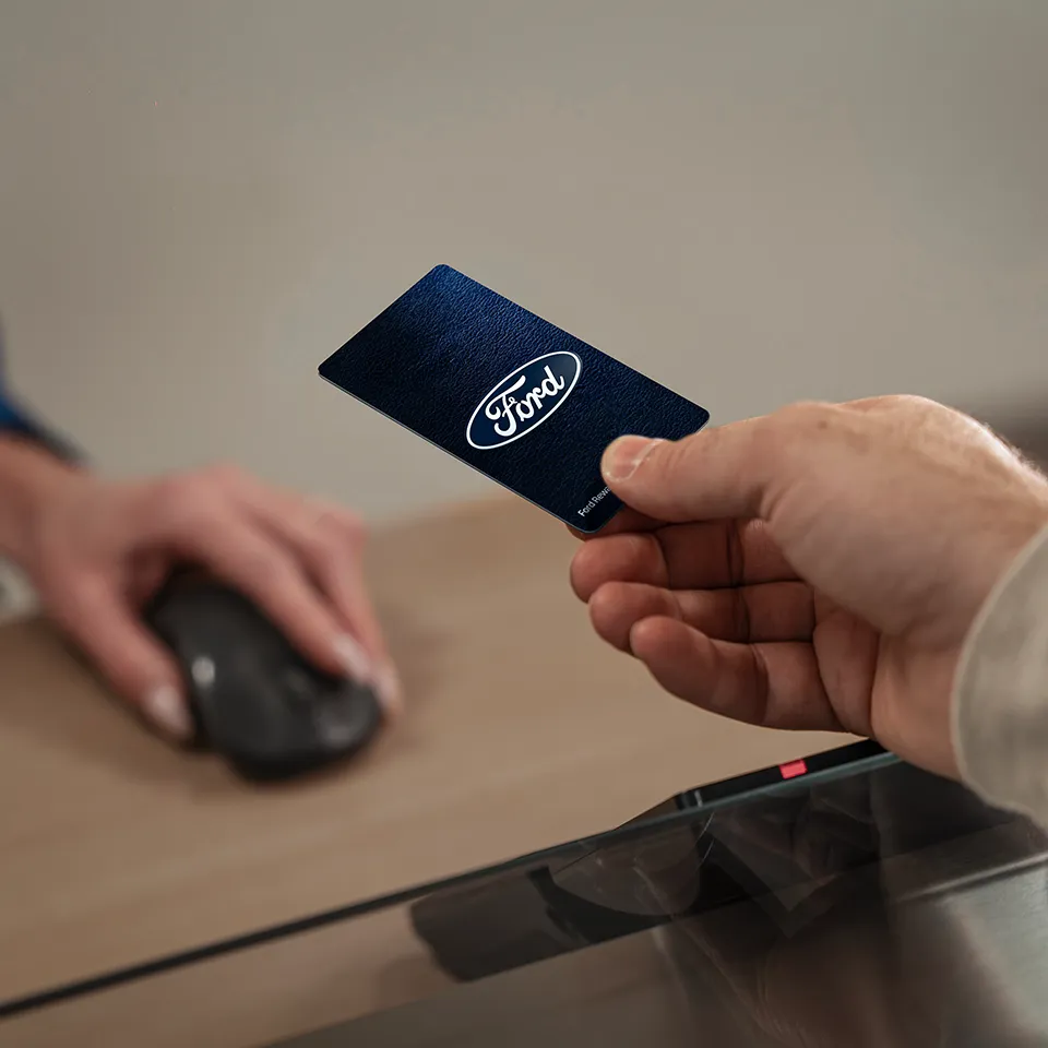 Ford service card being presented at a counter